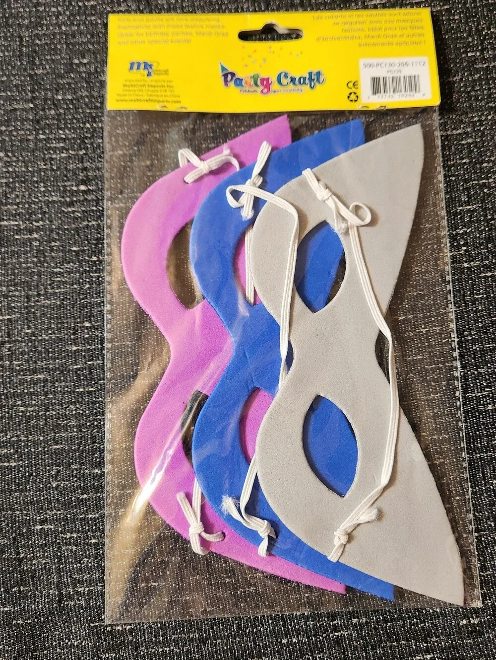 Festive sequin masks in purple, blue, and silver with polka dots
